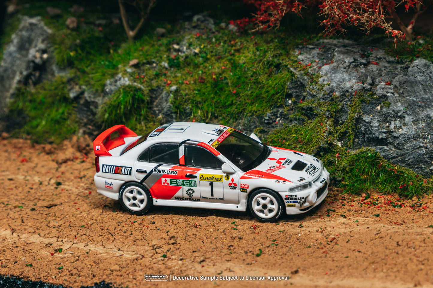 (Preorder) Tarmac Works 1:64 Mitsubishi Lancer Evolution IV Rallye Monte-Carlo 1997 Tommi Mäkinen / Seppo Harjanne T64G-076-97MCR01