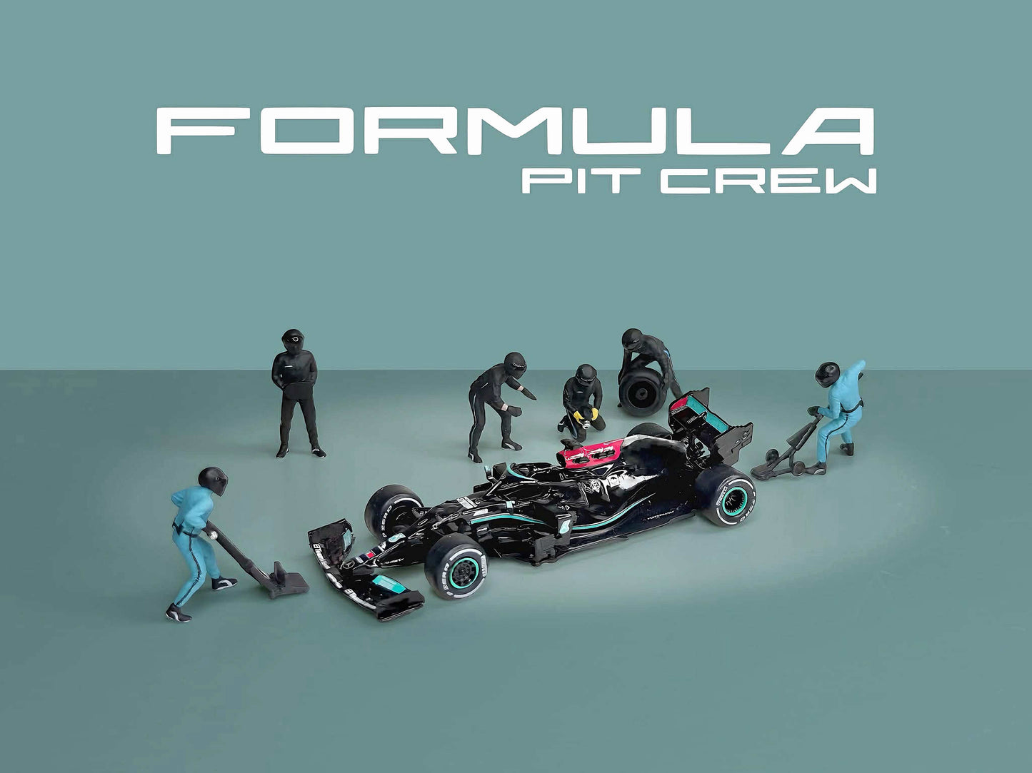 Model of a Formula 1 pit crew working on a car with 'Formula Pit Crew' text above.