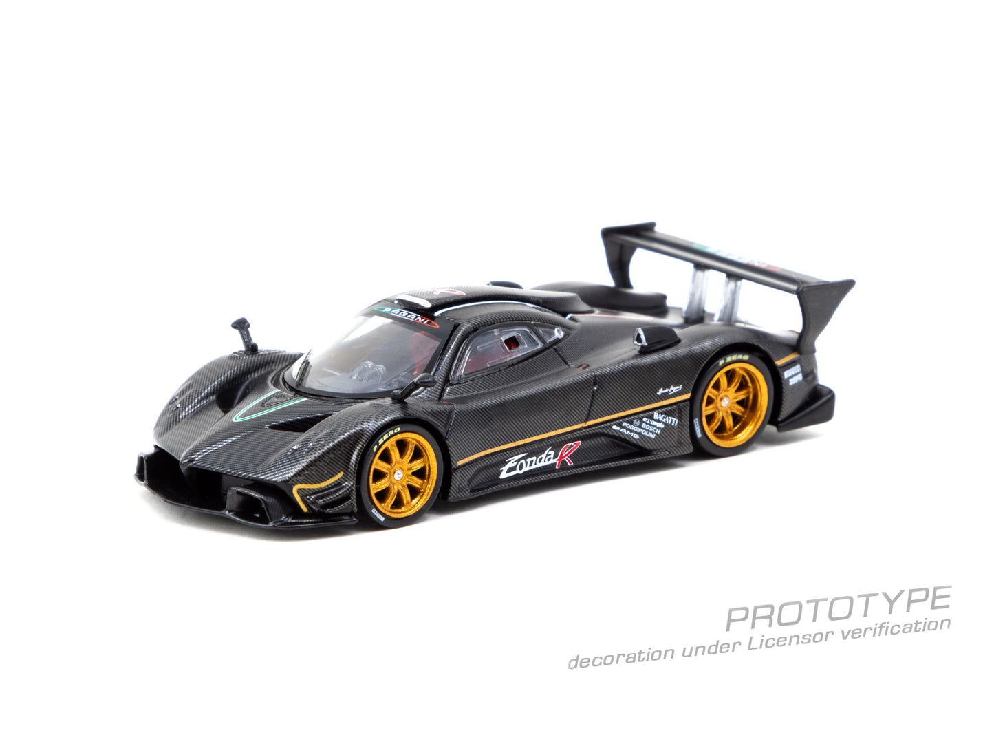 Model of a sports car with a black and yellow design on a white background