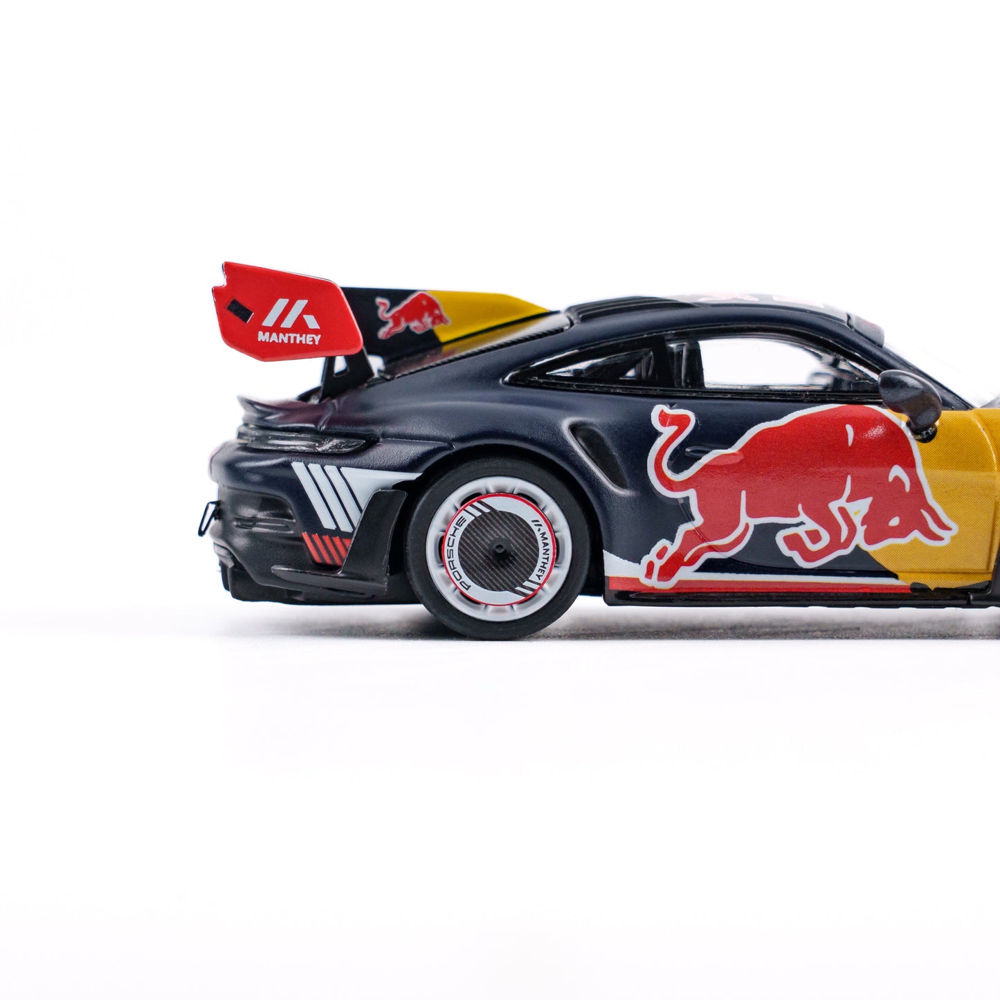 Model car with Red Bull branding on a white background