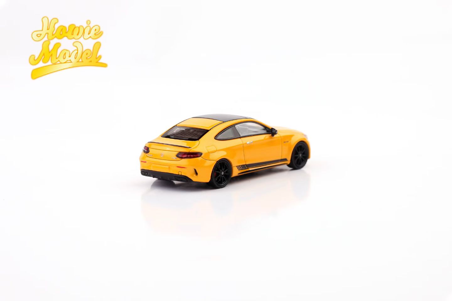 Yellow model car on a white background with 'Kono Model' branding.