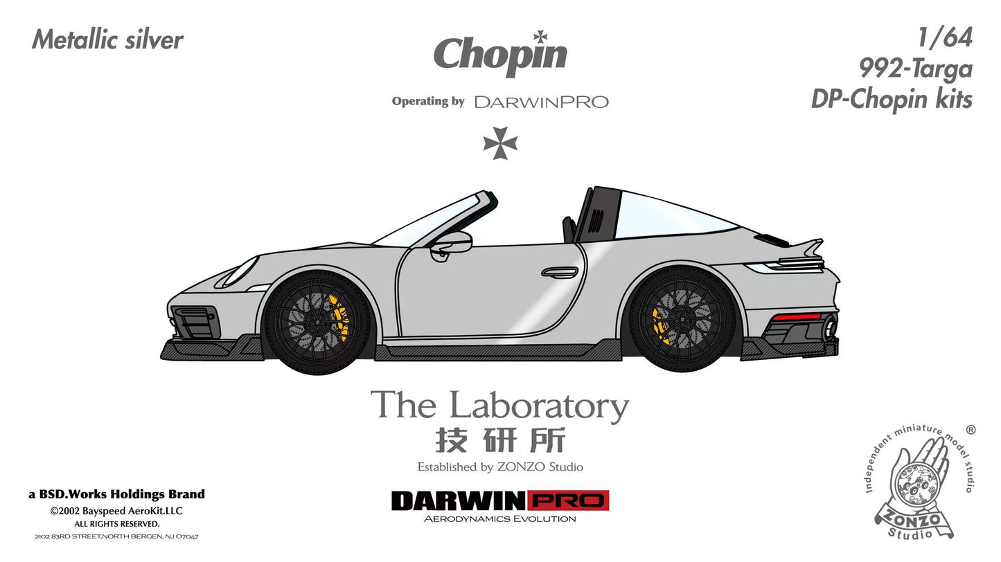 Model car kit of a Porsche 992 Targa with branding and specifications on a white background