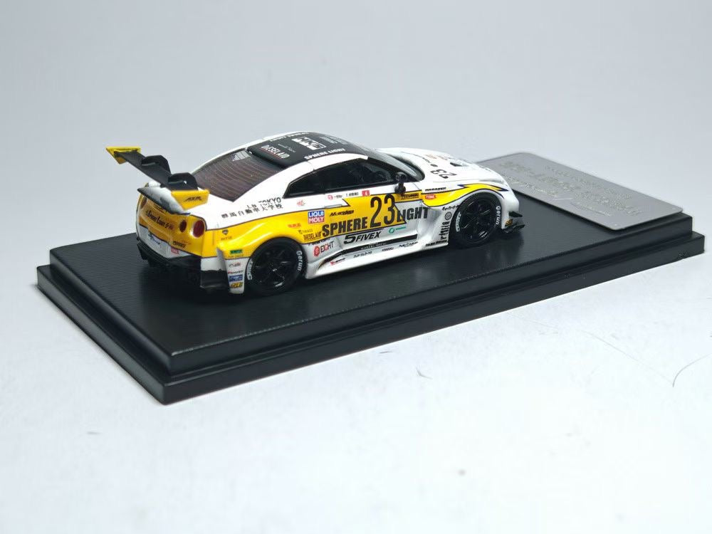 Model car on a display stand with a gray background