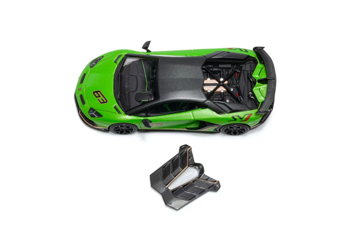 Green toy car with a black roof and a detached black component on a white background