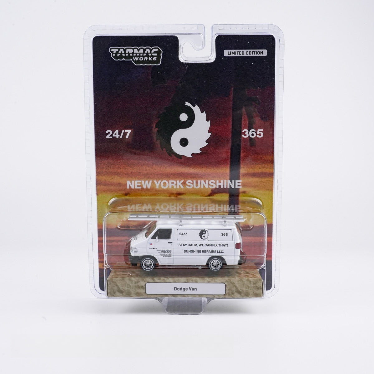 Model Dodge van in packaging with 'Tarmac Works' branding and sunset design.