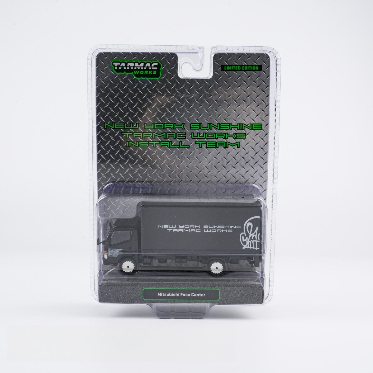 Model truck in packaging with Tarmac Works branding on a white background