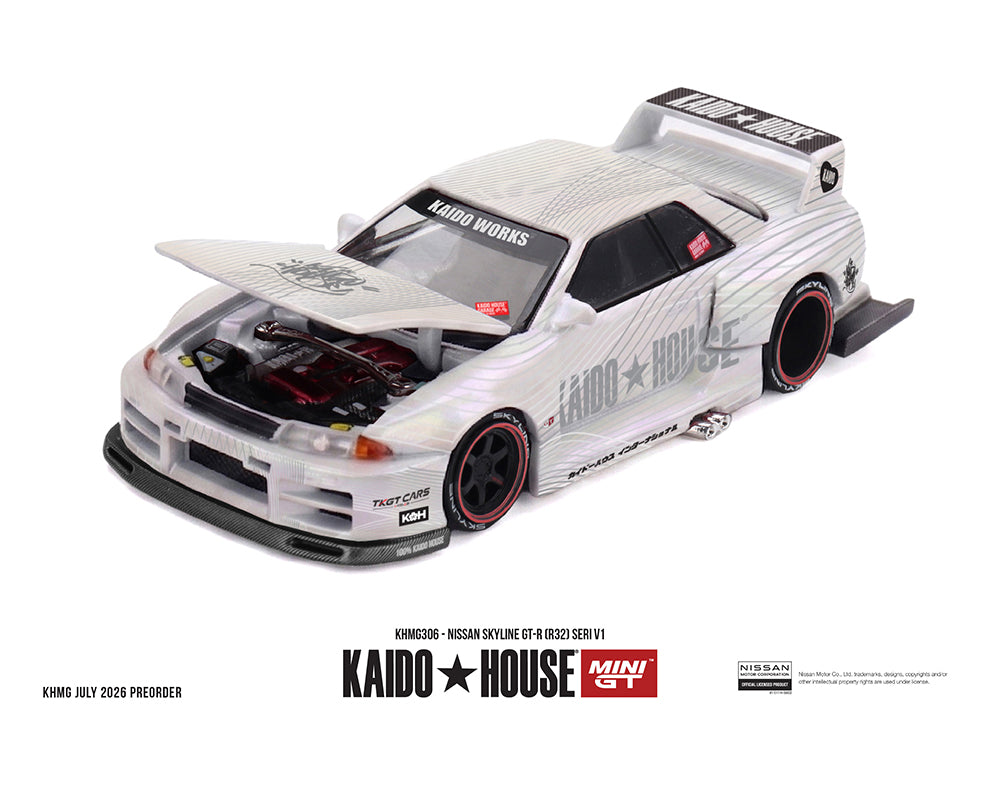 A 1:40 scale model of a Kaido Works Nissan Skyline GT-R (B16R) Series VI car, shown with its hood open to reveal a detailed engine bay. The car features a white and silver livery with black decals, black wheels with red-rimmed tires, and a rear spoiler.