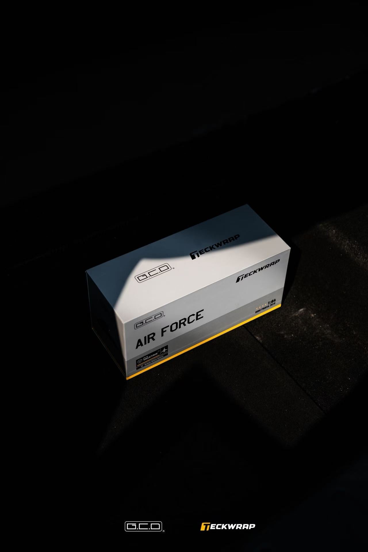 Box of GCD Air Force Hino Profia 700 DarwinPro &TECKWRAP Combat Grey on a dark background