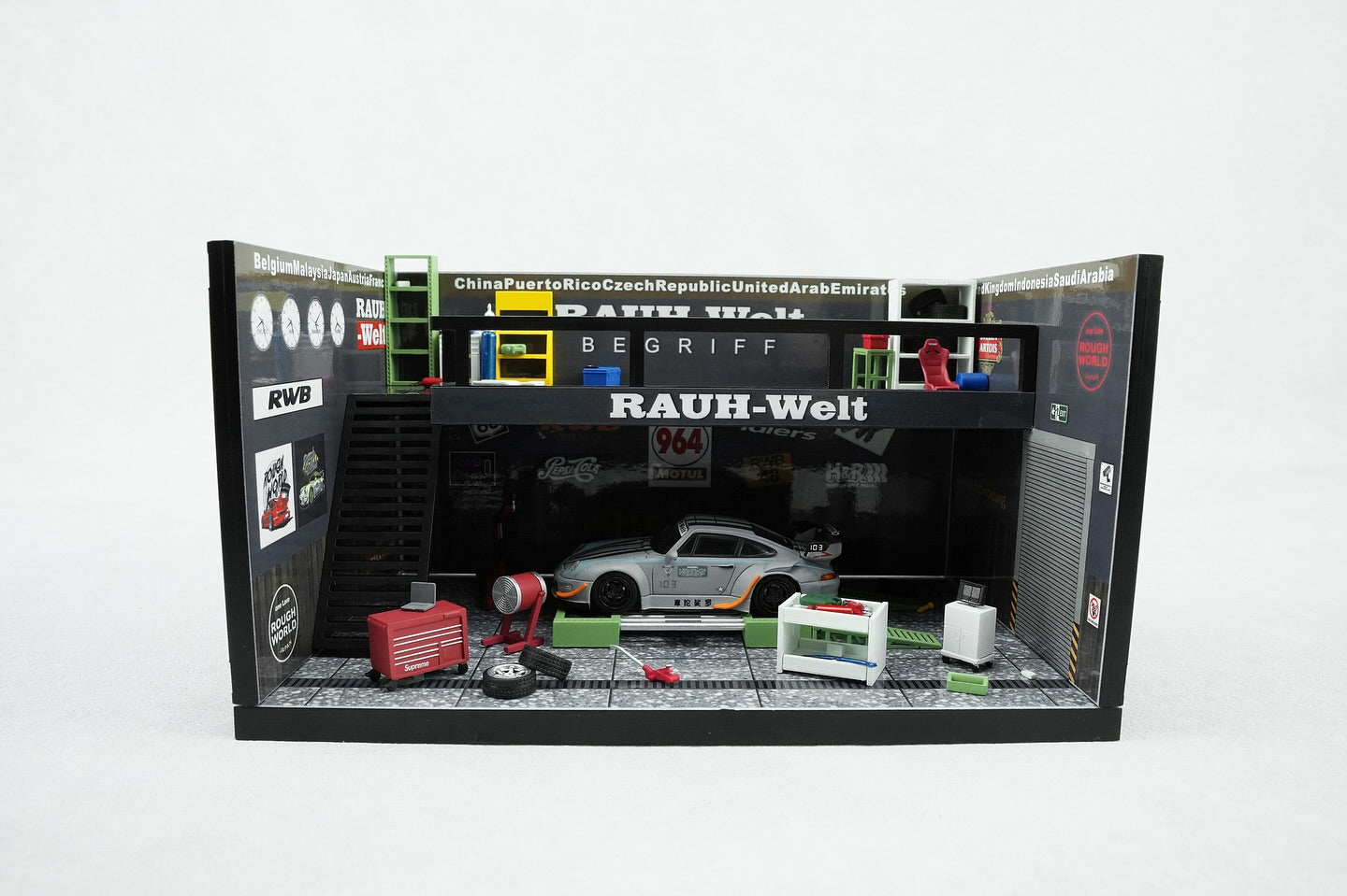 Model car display with detailed accessories and branding on a white background