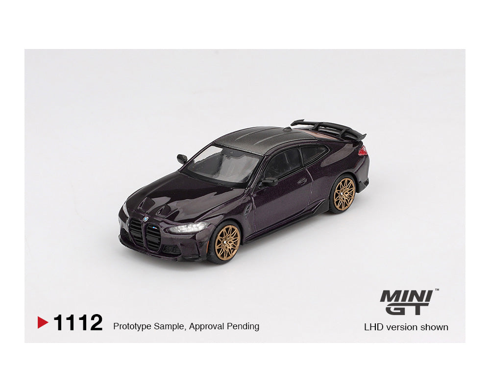 Model car of a BMW on a white background with 'MINI GT' branding.