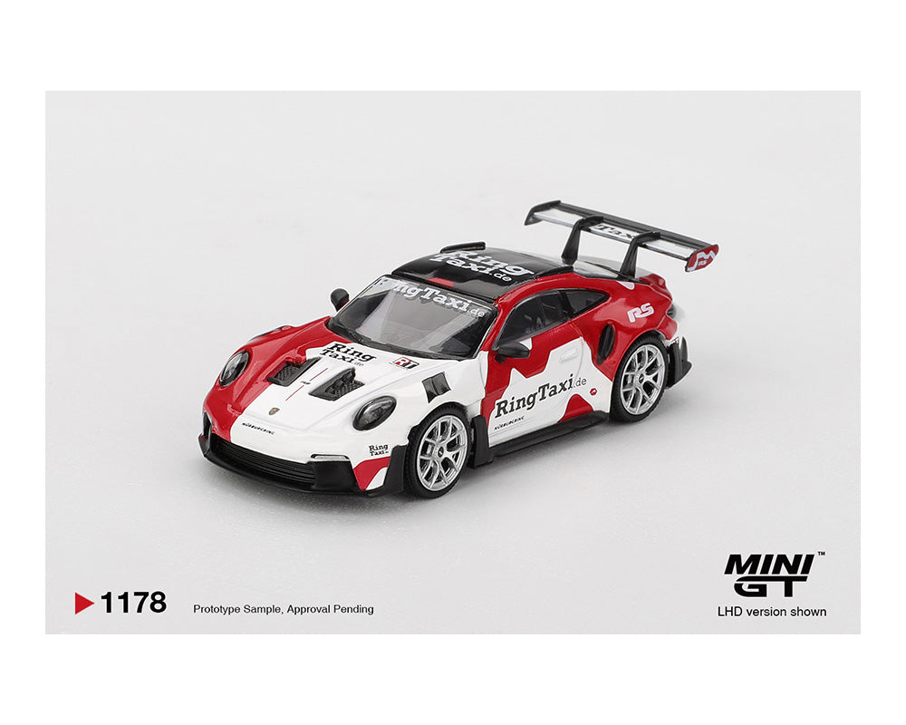 Model car with 'Ring Taxi' branding on a white background, featuring the Mini GT logo.