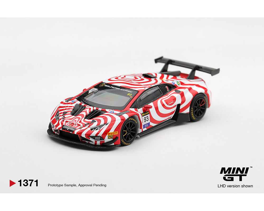 A Mini GT scale model of a Lamborghini Huracan race car, featuring a distinctive red and white spiral pattern on a clean white background. The model includes a black rear wing and black wheels, with Mini GT branding visible in the bottom right corner.