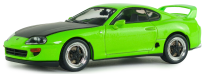 Green sports car model on a black background