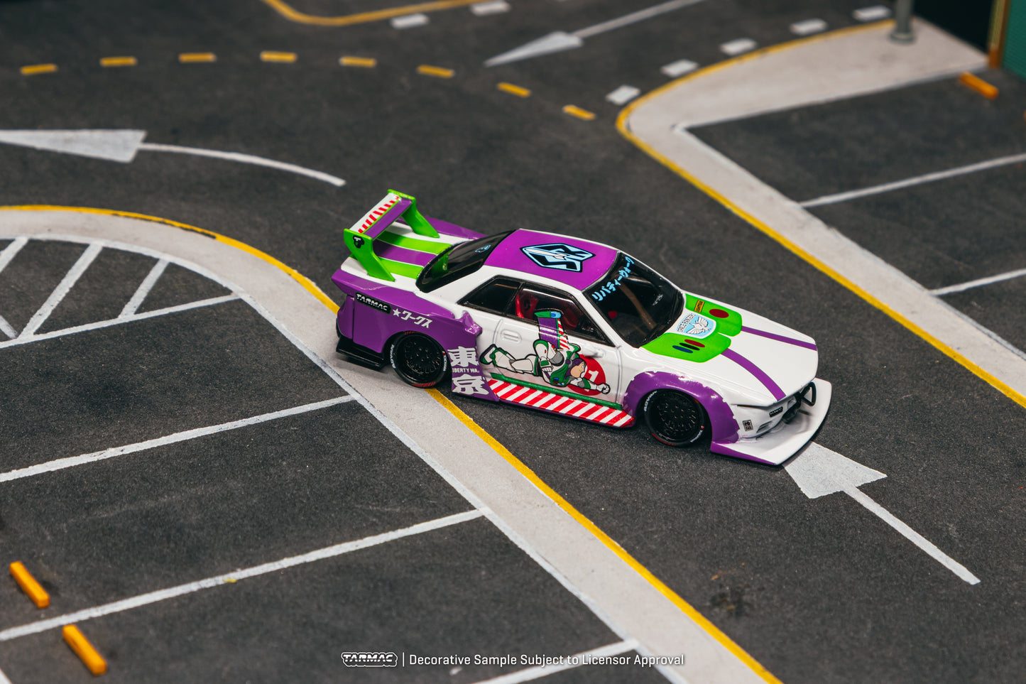 A toy car styled like Buzz Lightyear's suit, with purple and green accents, races on a miniature track.