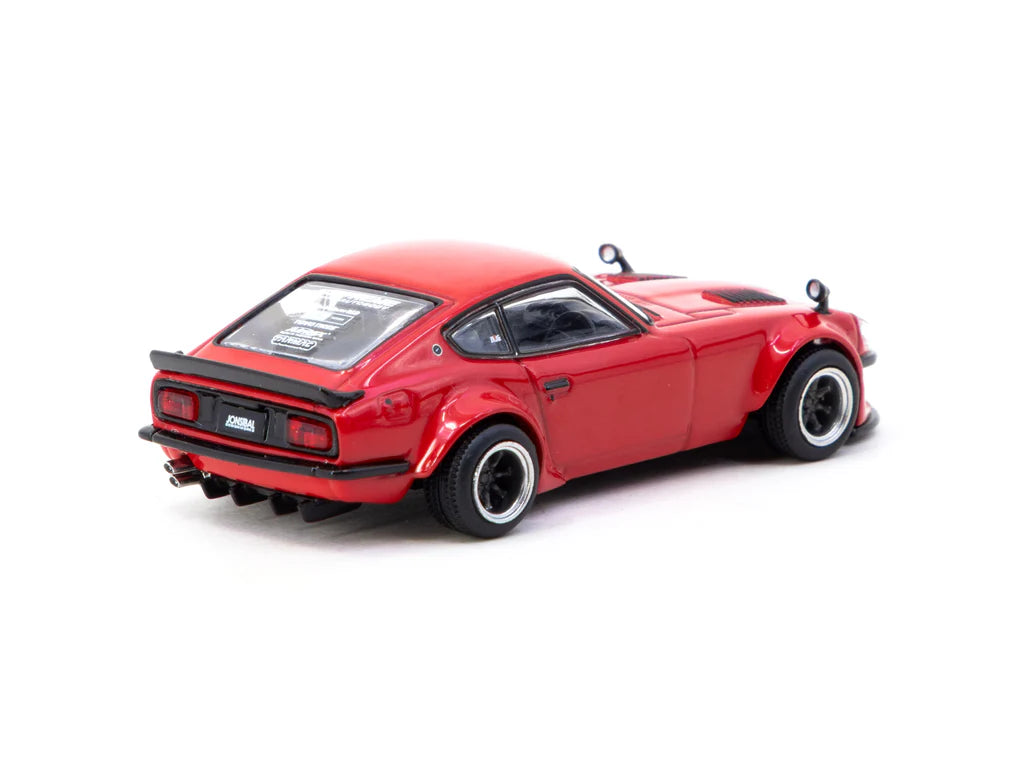 Red model car on a white background