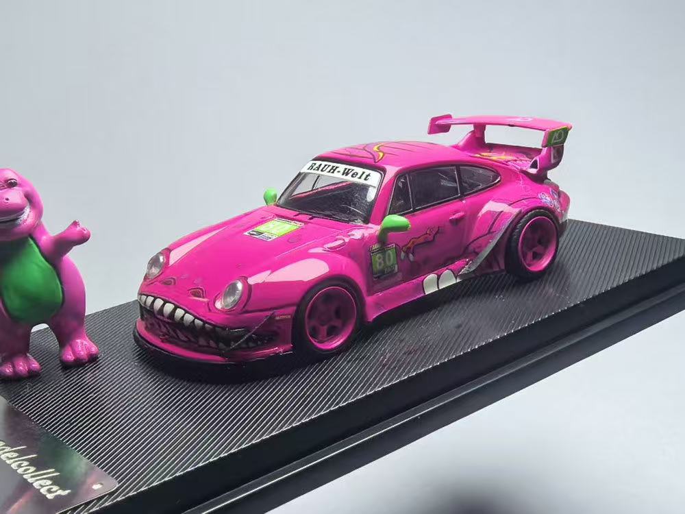 Pink model car with a dinosaur toy on a black platform