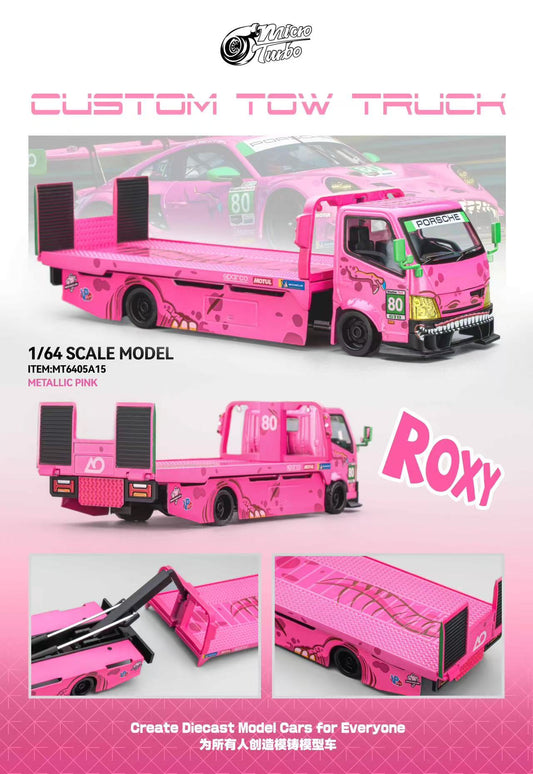 Pink custom tow truck model with 'Roxy' branding on a pink background