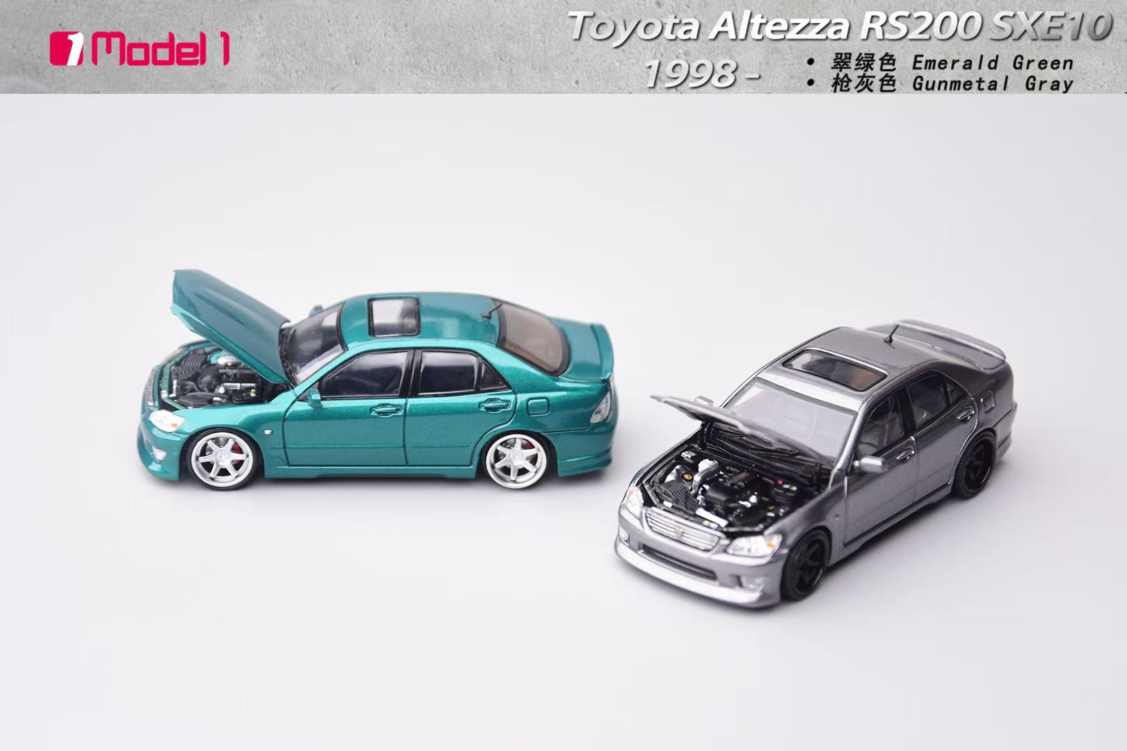 Two model cars, one teal and one gray, on a white background with 'Model 1' branding.
