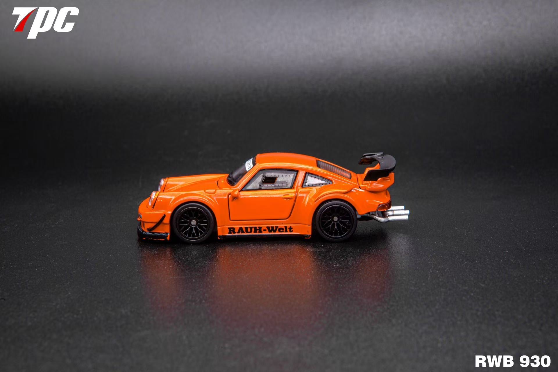 Orange model car on a reflective black surface with 'TPC' branding.