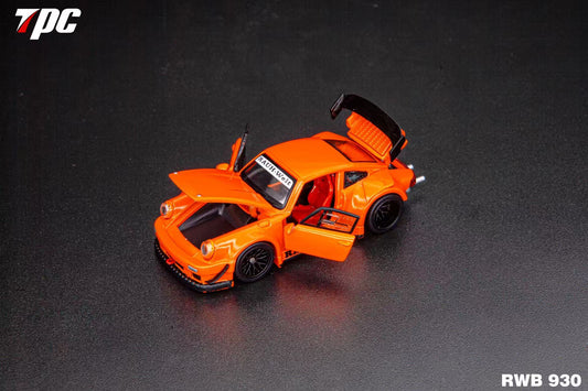 Orange model car with open doors on a dark background