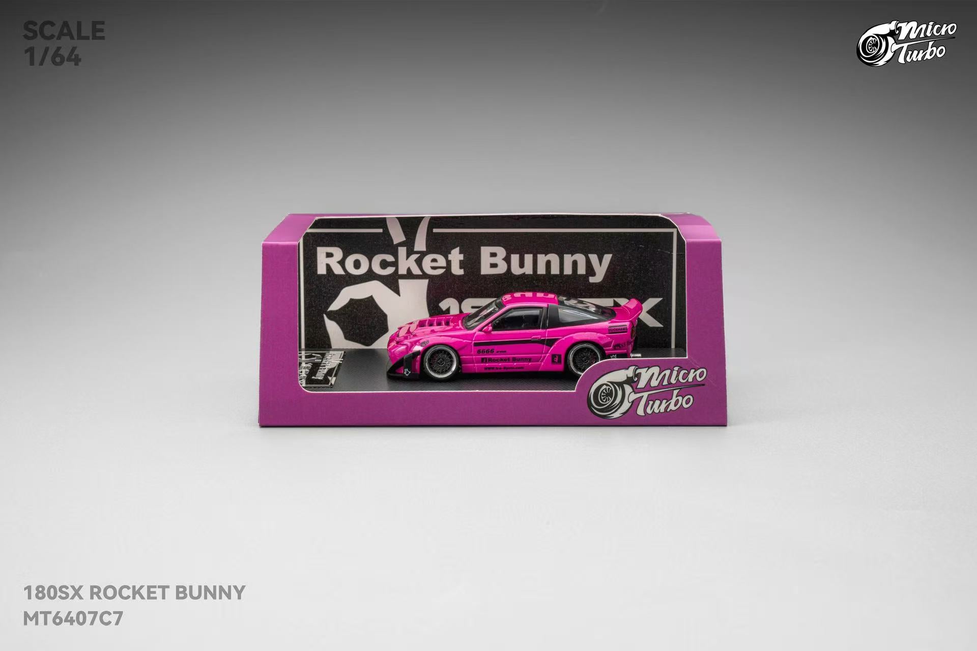 Model car packaging with pink car and 'Rocket Bunny' branding on a gray background