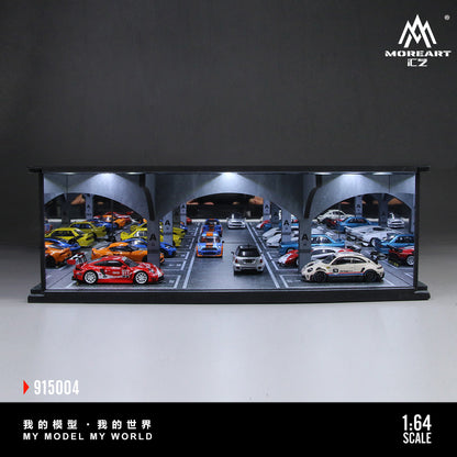 Model car display case with multiple cars inside, featuring the brand 'MoreArt'.