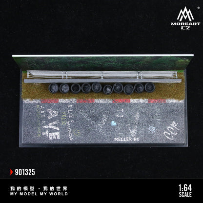 Model train set with detailed tracks and scenery on a black background, featuring the brand 'MoreArt'.