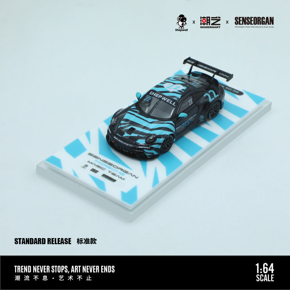 Porsche 911 GT3 R Model car on a display stand with branding and text on a light blue background, made by ModernArt