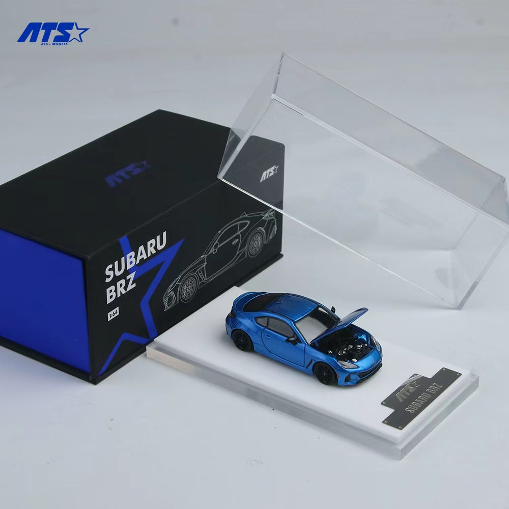 Blue model car on a white platform with a black box labeled 'Subaru BRZ' and ATS logo.