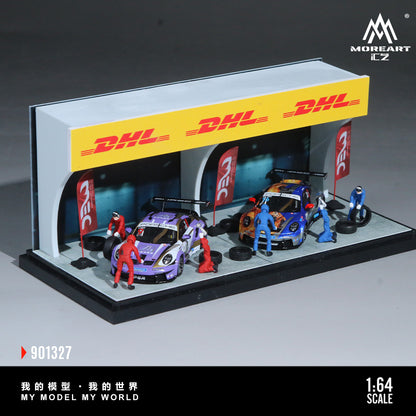 Model car garage with cars and workers under a DHL banner, featuring the MoreArt CZ brand.