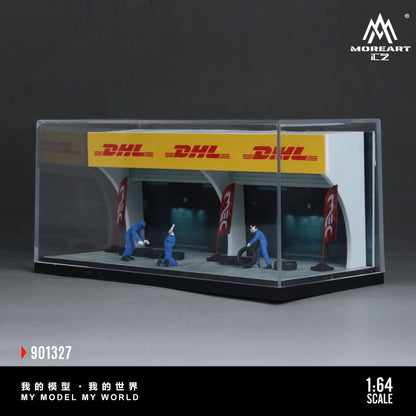 Model of a DHL service center with workers and a transparent display case, featuring the MoreArt CZ brand.