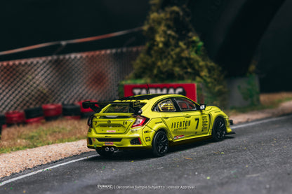 Yellow model car on a track with 'Aventon' branding