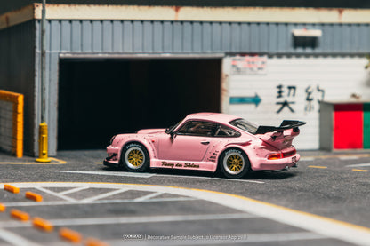 Pink sports car with a large rear wing on a racetrack