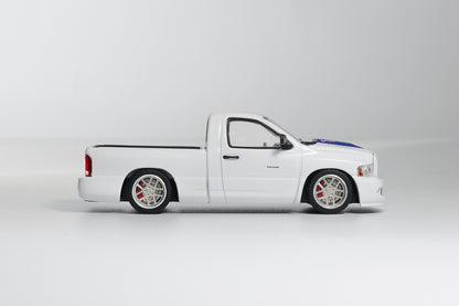 White pickup truck with black accents on a white background