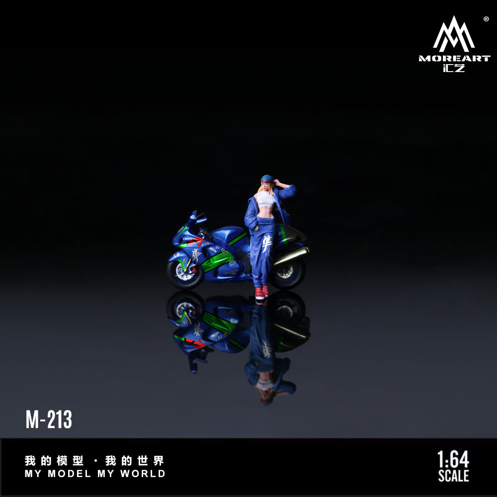 Model figure of a person with a motorcycle on a reflective surface, with 'MoreArt' branding.