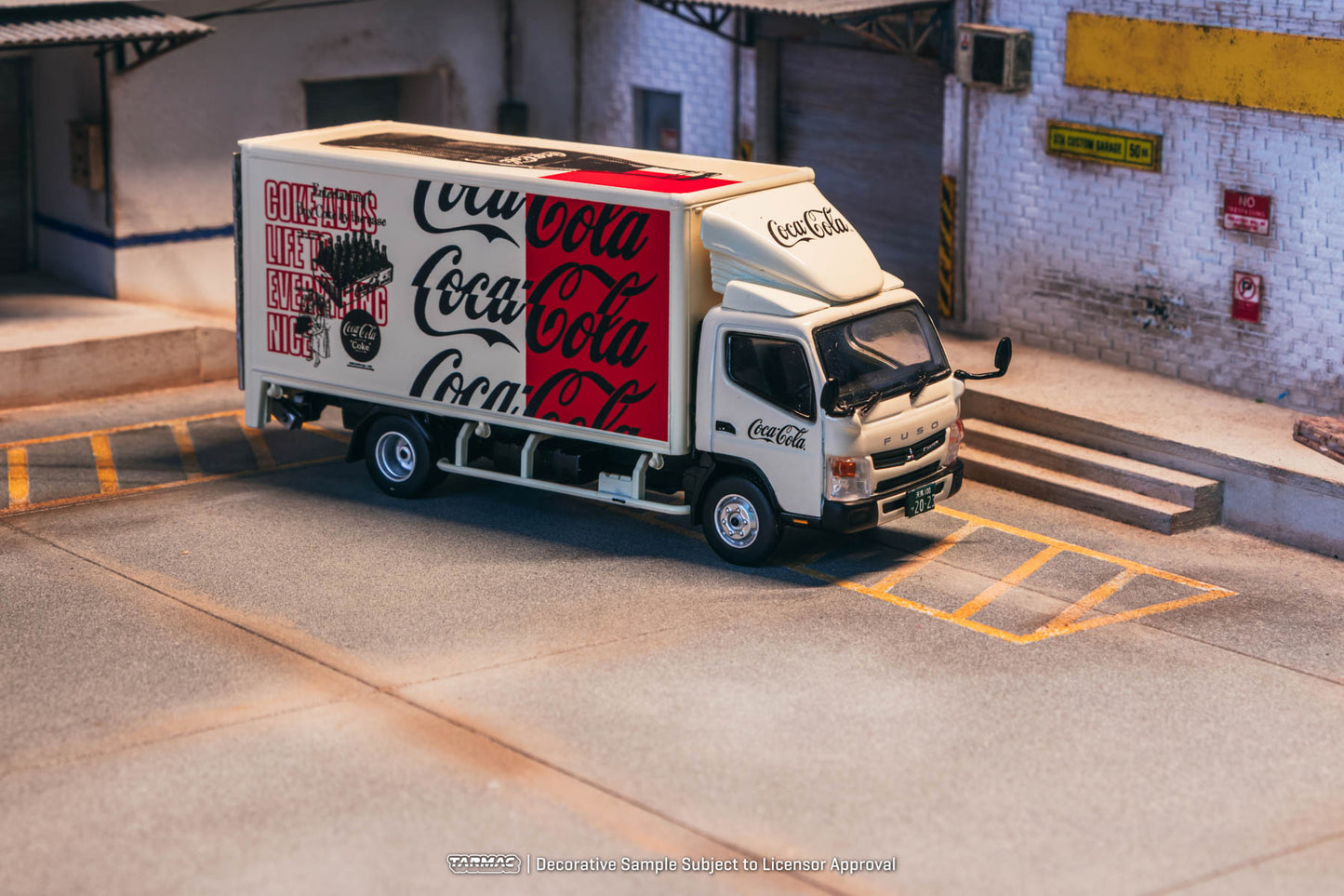 Model of a Coca-Cola delivery truck in an urban setting