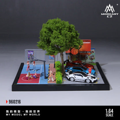 Model basketball court with cars and people, featuring MOREART CZ branding.