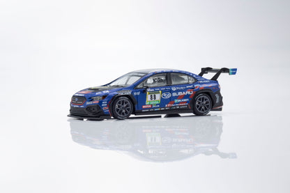 Model car of a Subaru race car on a reflective surface with a white background