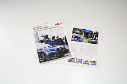 Brochure or magazine with car images on a white background
