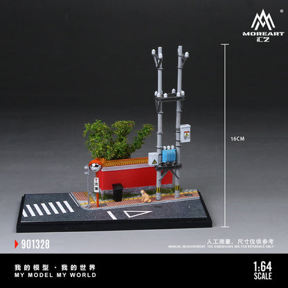 Model of a street scene with a traffic light, building, and tree on a dark background