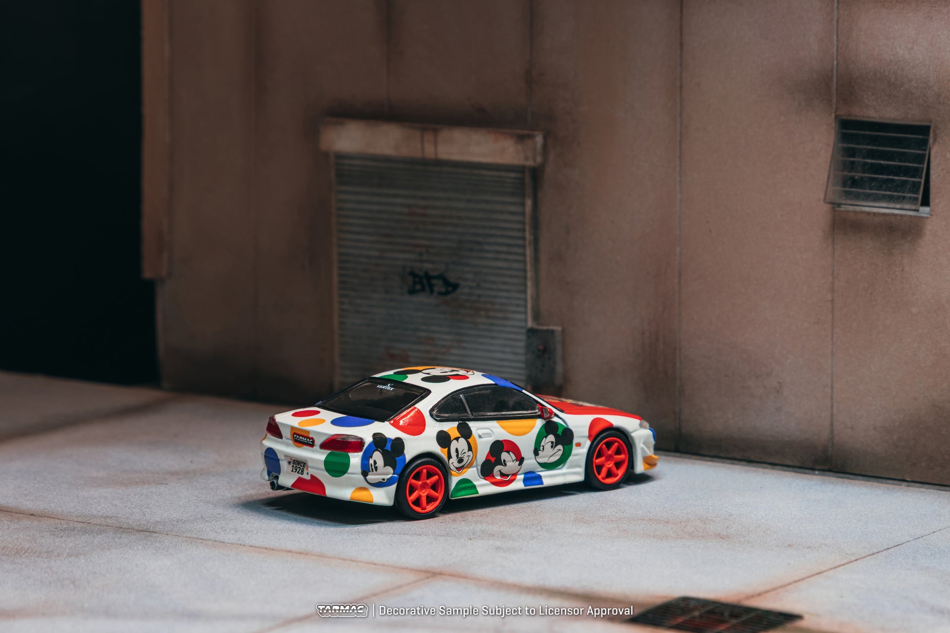 Colorful cartoon-style car parked in front of a building