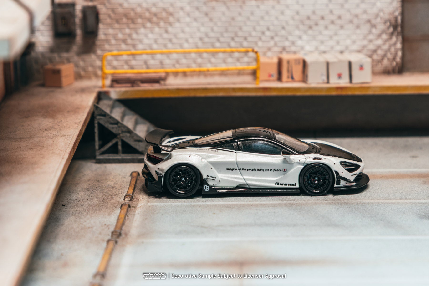 Model car on a wooden platform with a modern interior background