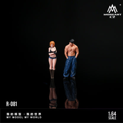 Two action figures of a man and a woman on a black background with 'MOREART CZ' branding.