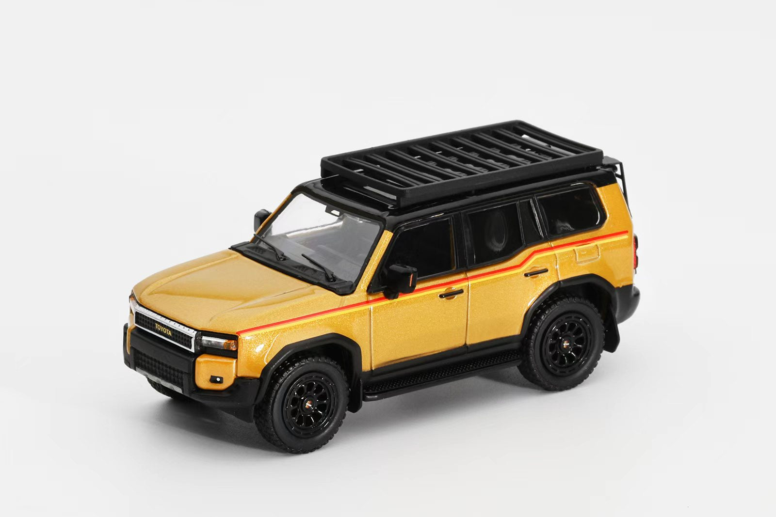 Yellow SUV model with black roof rack on a white background