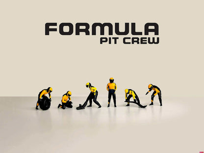 Model pit crew figures with 'Formula Pit Crew' text on a beige background