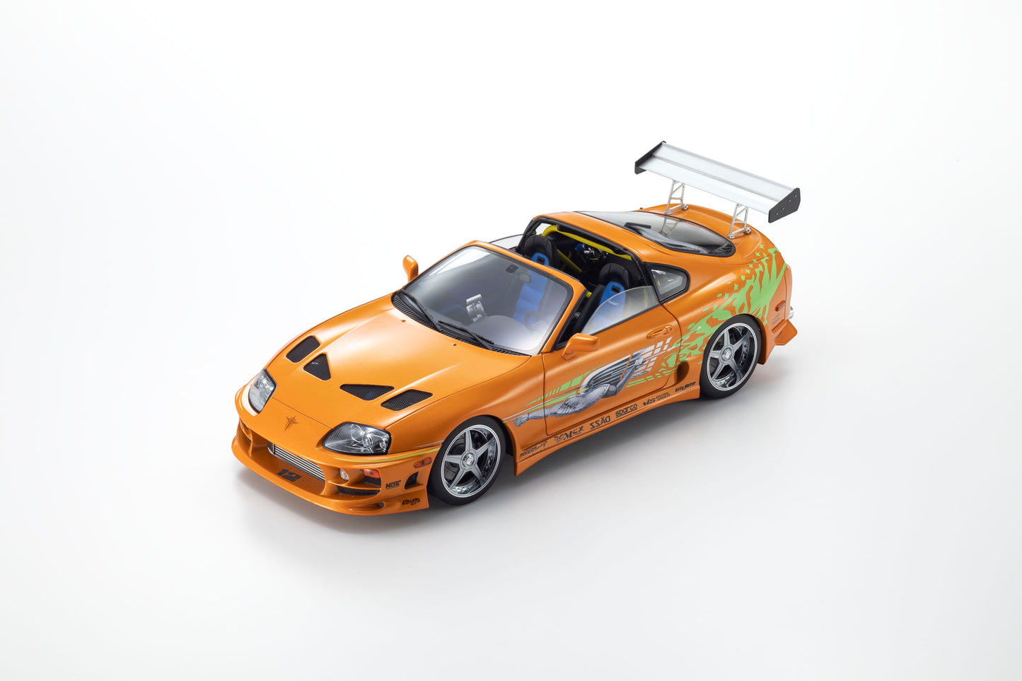 Model car of a sports car with a spoiler on a white background