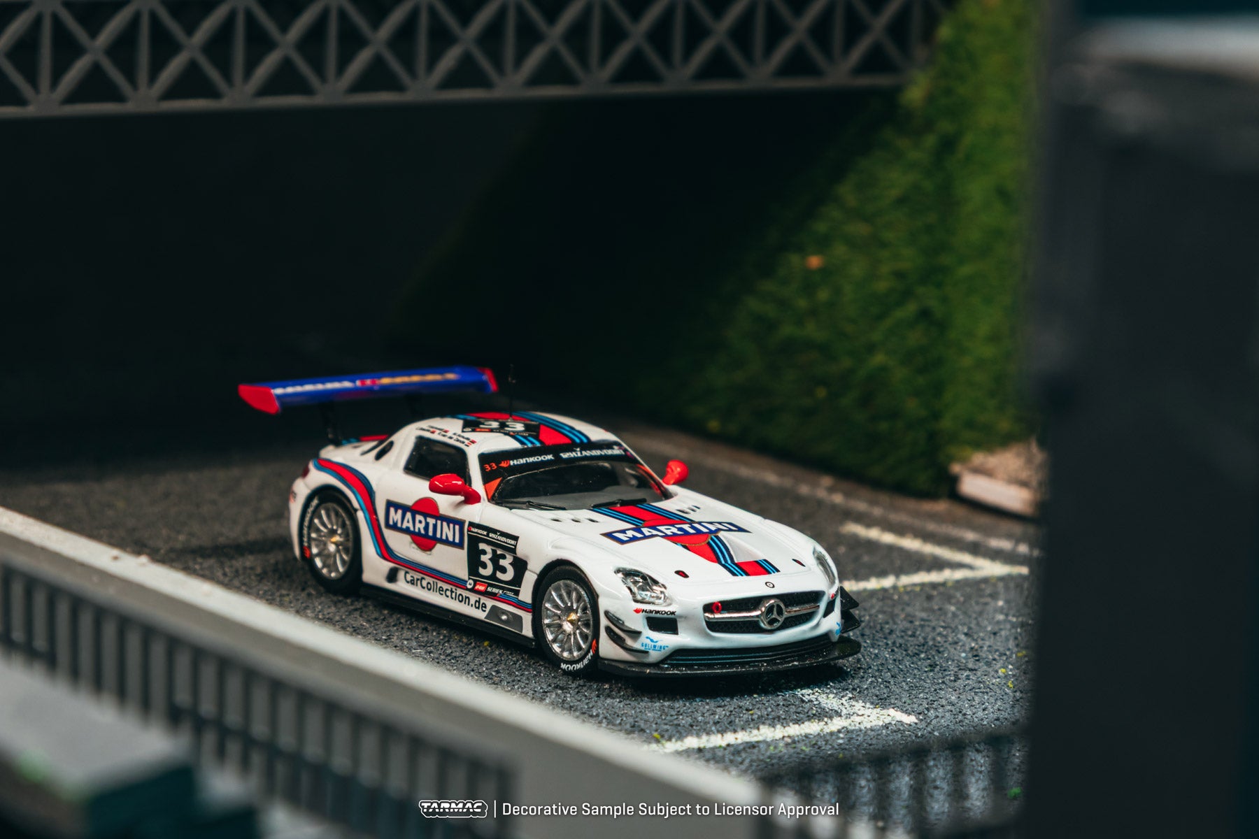 Model car on a track with 'Martini' branding
