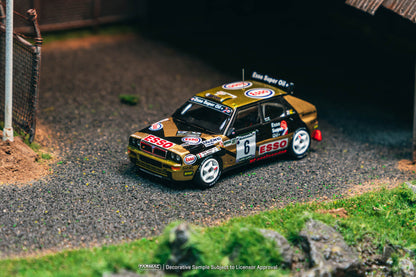 Model car on a miniature road with 'Esso' branding
