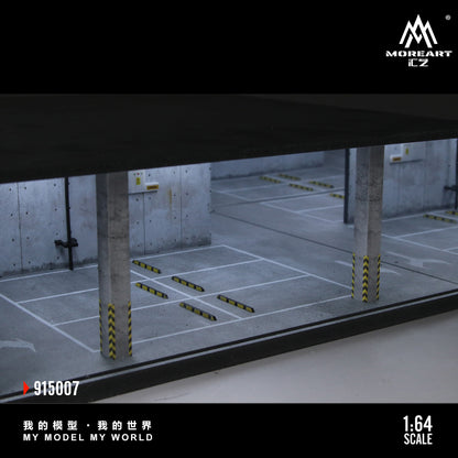 Model of a parking garage with concrete pillars and floor markings, featuring the MoreArt CZ logo.