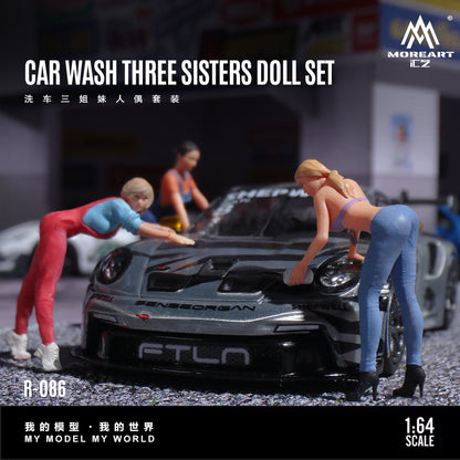 Model dolls cleaning a car with 'MoreArt' branding.